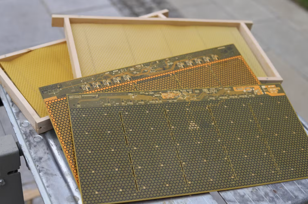 Faced with dwindling bee colonies, scientists are arming queens with robots and smart hives