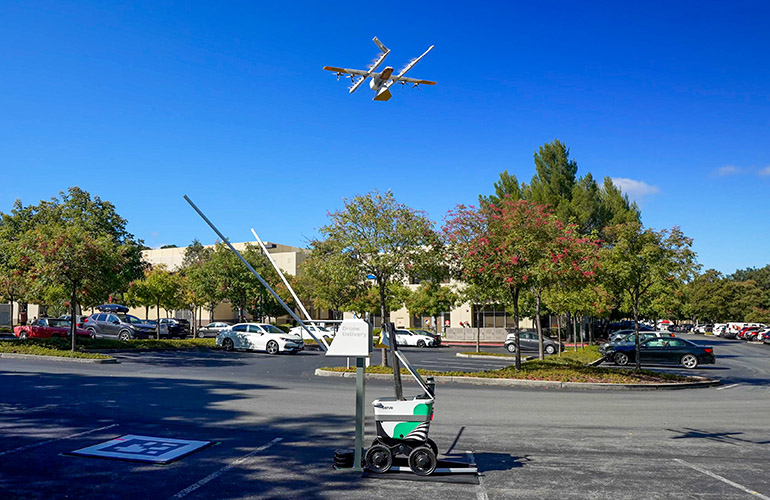 Wing and Serve are collaborating for robot-to-drone delivery with an AutoLoader, shown here.
