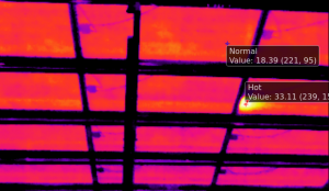 Processed thermal photo detecting a hot spot on the underside of a solar panel.